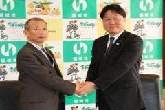 写真：ALSOK常務執行役員鈴木基久様と高橋市長